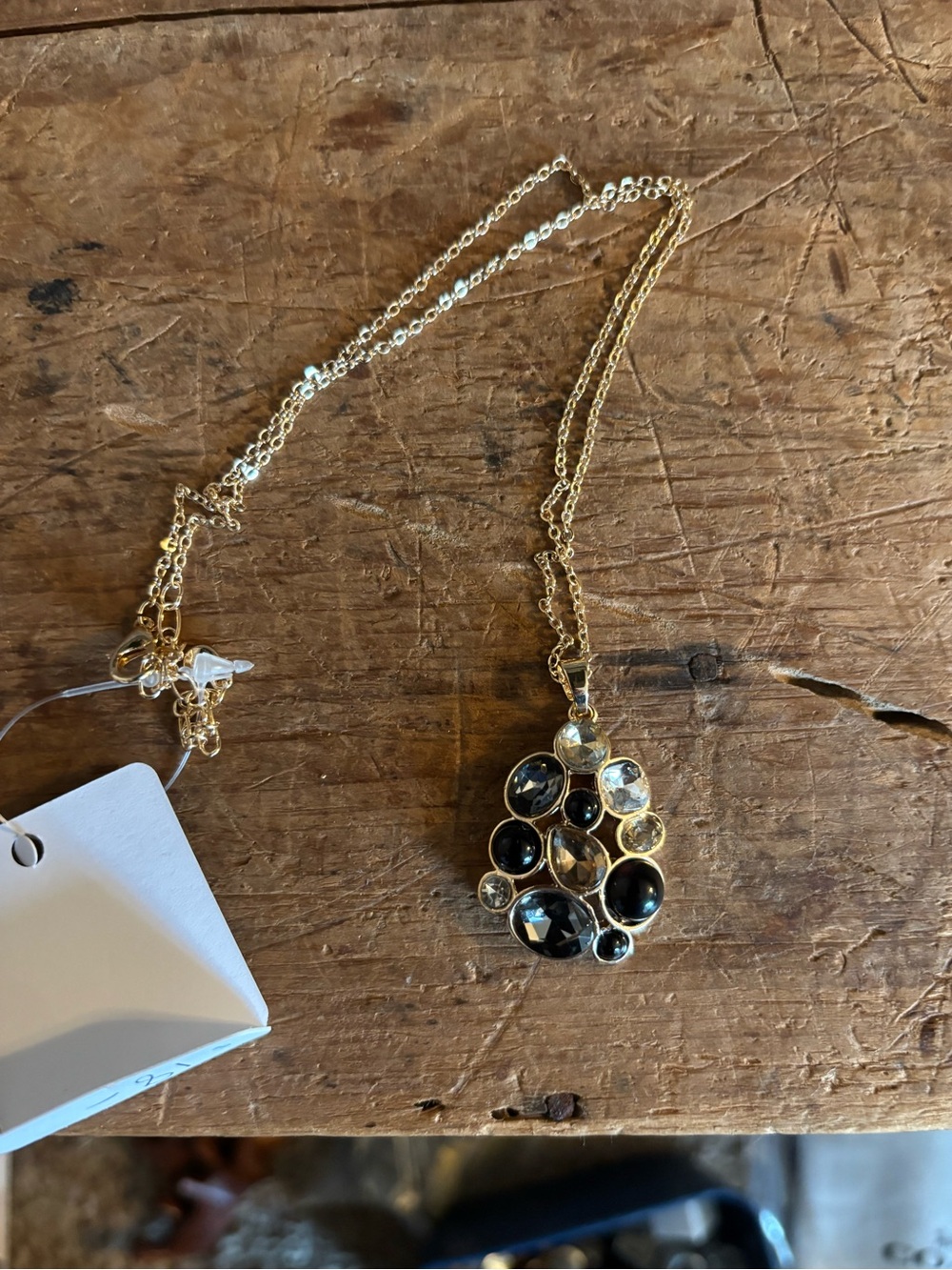 Gold Tone Pendant Necklace with Black and Clear Stones